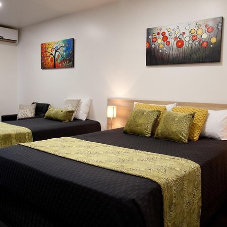 Abode37 Motel Емералд Номер фото